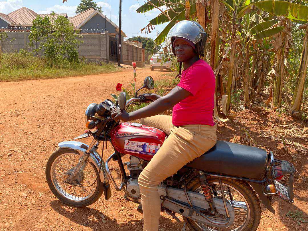 Baker with his motorbike. 