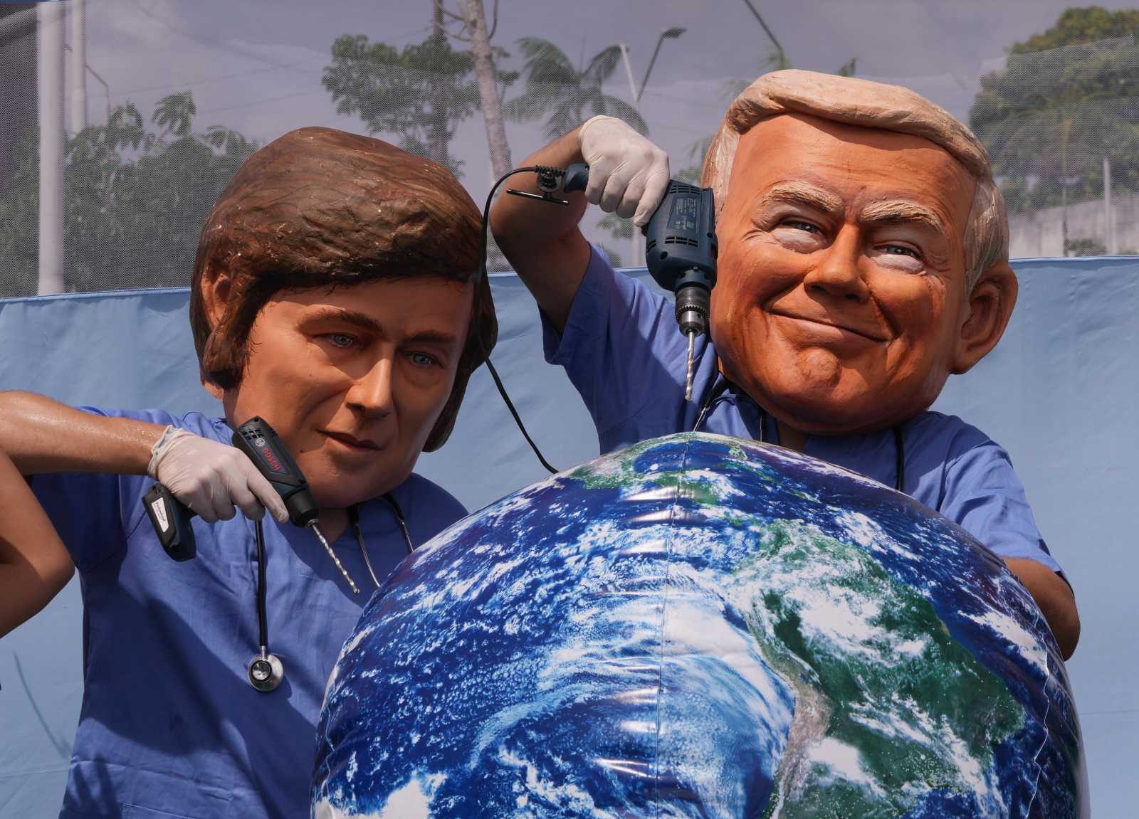 Argentina’s President Javier Milei and US President Donald Trump drill into the world: activists in costumes during COP30.