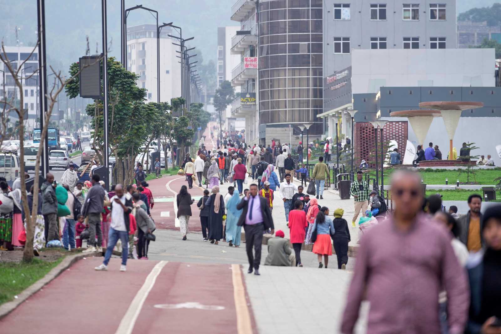 People walk on the street of Addis Ababa, Ethiopia.