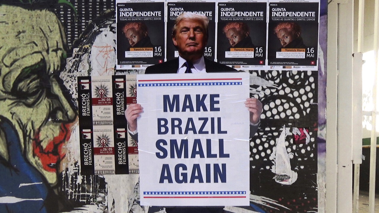 Picture of Donald Trump on a poster-covered wall in São Paulo, 2019. The fact is: Brazil has not made any major concessions to the US.