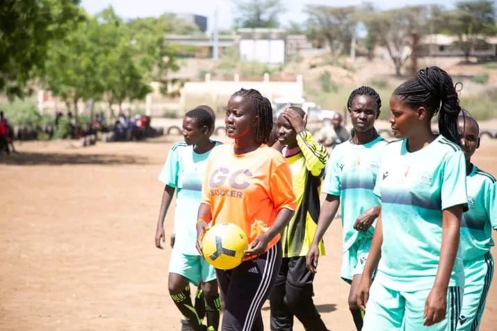 Rael Lomoti and members of one of her Desert Roses teams on their way to a match.