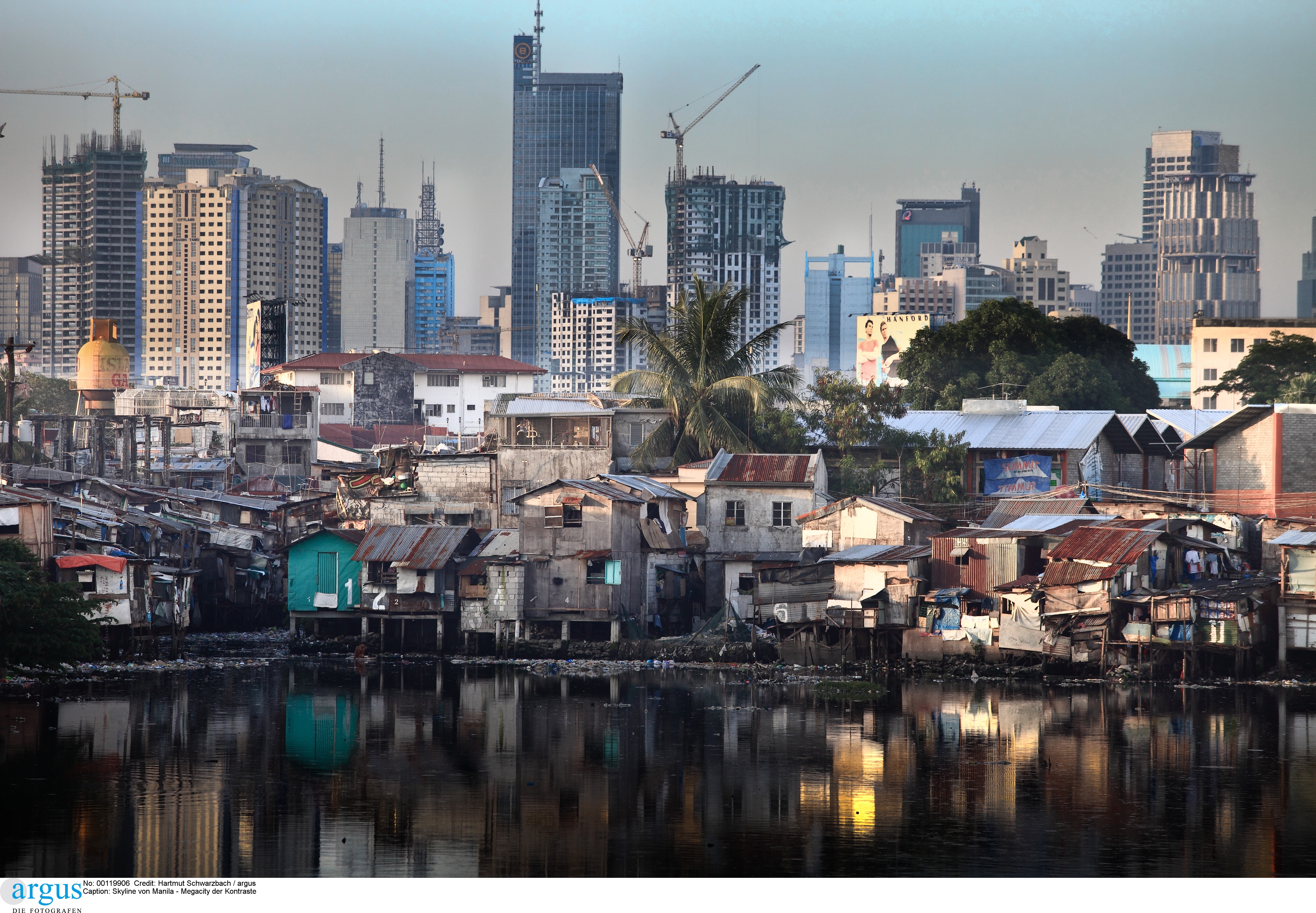Inequality has been growing almost everywhere: slum huts and highrise buildings in Manila in 2009.