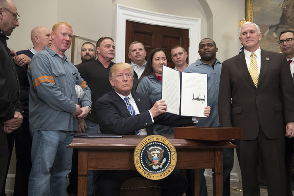 Trump invited steel workers to watch him sign his proclamation on tariffs.
