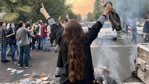 A woman in Iran is protesting for her rights.