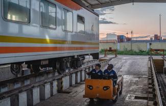 A Chinese instructor and his apprentice inspect a train on Mombasa-Nairobi Railway, a flagship project of China-Africa cooperation, in Nairobi, Kenya.