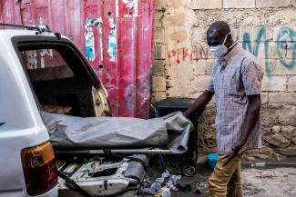 The body of a man who died of tuberculosis in Port-au-Prince is taken to the morgue. Tuberculosis is generally treatable and curable.