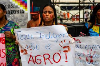 “Indigenous land is not farmland”: protest during a summit of Amazonian governments in Belém, Brazil, in the summer of 2023.