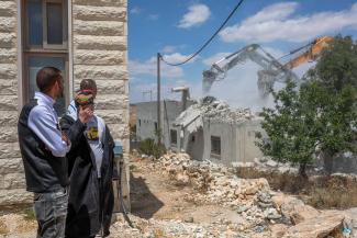 The Israeli Civil Administration and Israeli border police demolish a home in Al-Jawaya, a village in the Masafer Yatta region of the southern West Bank, in May 2024.