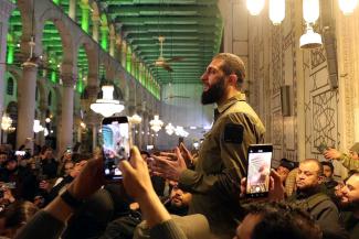 It is too early to tell whether he will prove sectarian or pluralist: HTS leader Ahmed al-Sharaa speaking in the Umayyad Mosque on 8 December. 