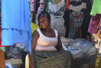 Susanne Giese Janet Kyerewaa at her Kantamanto stall in the summer of 2024.