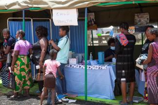 Medical care for children in Lusaka, Zambia. The healthcare sector is hardest hit by the cuts in global funding. 
