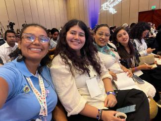 Xiomara Acevedo (white blouse, hair down)  at the TAFF conference in Santa Marta, Colombia, in April.