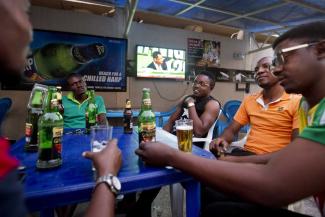 Men in a bar in Kano – drinking alcohol has become a pastime in Nigeria.