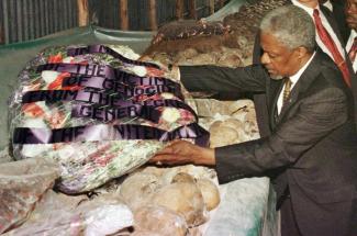 Kofi Annan visiting Rwandan genocide memorial as UN Secretary-General in 1998.