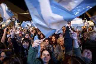 Supporters of Alberto Fernández celebrate his victory in the preliminary election.