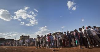 Lining up at a poll station.