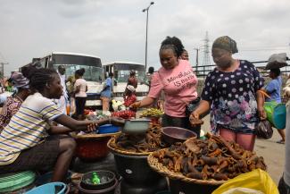 Informal businesses typically do not have access to capital: market vendor in Lagos.