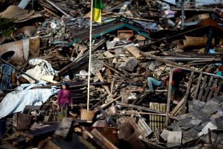 Survivor in devastated Barpak in 2015.