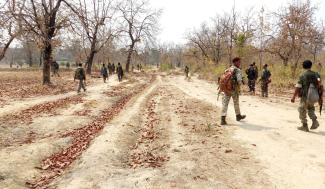 Paramilitary troops on patrol in Chhattisgarh after a gun fight with leftist extremists.