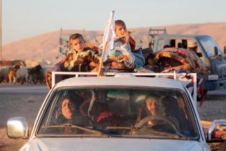 People fleeing from clashes between the Iraqi army and ISIS terrorists in Mosul in early November.