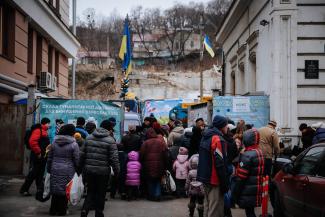 Internally displaced people collecting relief goods in Kiev in December.