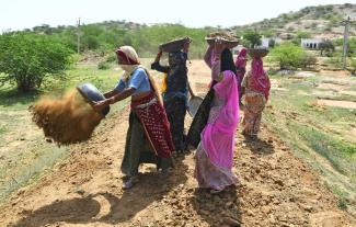 Beneficiaries of India’s MGNREGA, the Mahatma Gandhi National Rural Employment Guarantee Act.