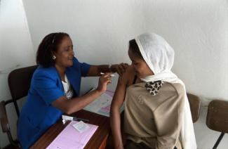 A woman is given a contraceptive injection in Addis Ababa, Ethiopia.