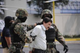 Joaquín “El Chapo” Guzmán being arrested for the second time in 2014. The head of the Sinaloa cartel managed to escape from prison twice, but was extradited to the USA in 2017.