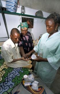 The progress made in the fight against HIV/Aids is not enough: A person living with  HIV is given medication in Abomey.