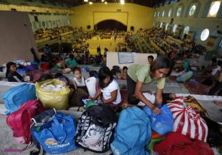 One year after Typhoon Haiyan, this gym on Leyte island was turned into a provisional shelter as another tropical strom was approaching.