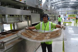 Production of biodegradable kidney dishes at the Bio-Lutions plant in Bangalore.