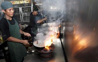 Mith Samlanh runs a restaurant in Phnom Penh, where former street children work as cooks or waiters.