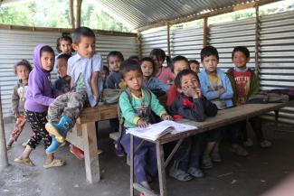 Always too hot or too cold: provisional post-earthquake classroom.