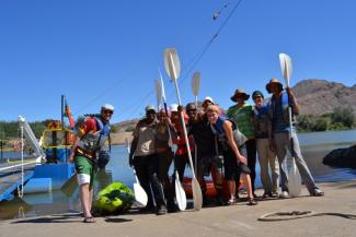 Local kayak guides with the evaluation team in Sendelingsdrif at the border river Orange.